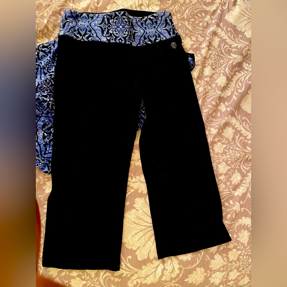 Workout outfit, the pants are to your knee size medium and the shirt is a large.